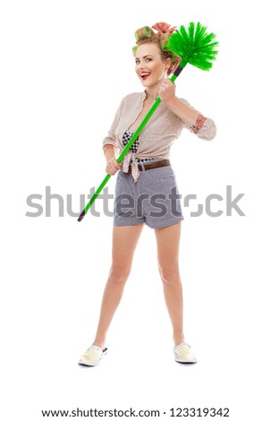 Funny cheerful smile housewife / girl with broom, isolated on white. Full length / total shot of domestic woman