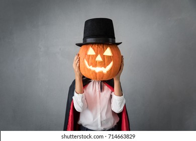 Funny Child Dressed Halloween Costume. Kid Painted Terrible Vampire. Autumn Holiday Concept