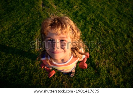 Similar – Happy girl with food on her mouth