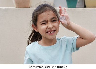 Funny Child Hold And Shows Grown Crystal. Growing Crystals Is A Popular Kids Craft And Fun Science Experiment.