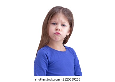 Funny Child Kid Making Face Isolated On White Background, Looking At Camera Waist Up Caucasian Little Girl Of 5 Years In Blue