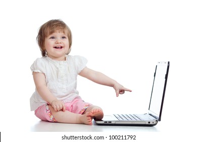 Funny child using a laptop over white background