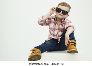 Funny Child.fashionable Little Boy In Sunglasses.stylish Kid In Yellow Shoes. Fashion Children