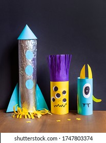 Funny children's paper and foil crafts. Aliens and rocket. An educational activity for the holiday of Cosmonautics Day on April 12. Halloween cute monsters. Martians landing on Mars. Space
