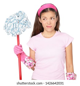 Funny Cleaning Girl Unhappy With Chores During Spring Cleaning At Home. Housewife Or Cleaning Lady Maid Asian Girl Looking At Mop Unmotivated To Clean, Isolated On White Background.