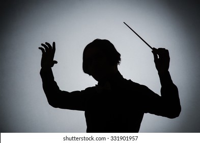 female conductor silhouette