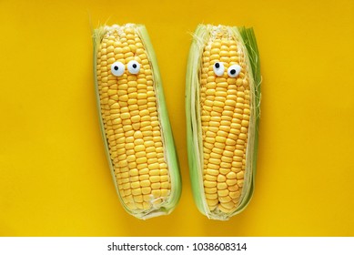 funny corns on yellow background