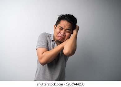 Funny Crying Face, Portrait Of Young Asian Man, Isolated Selective Focus.