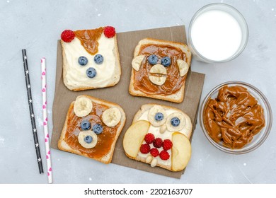 Funny Cute Bear,monkey,fox,owl Faces Sandwich Toast Bread With Peanut Butter,banana,blueberry,raspberry,milk. Kids Childrens Baby's Sweet Dessert Healthy Breakfast Lunch Food Art,close Up,top View