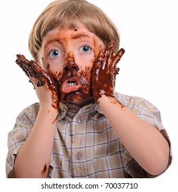 Funny, Cute Dirty And Bedaubed Boy - Chocolate On Hands And Face