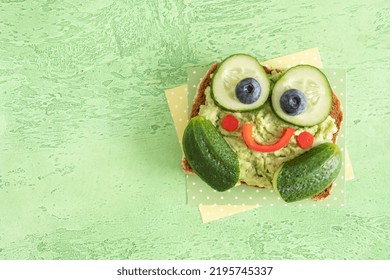 Funny Cute Frog Toast With Cucumber And Mashed Avocado