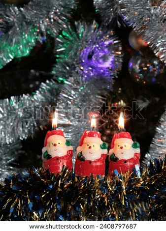funny decorative wax figures of brownies as festive candles for Christmas holidays