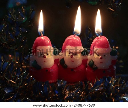funny decorative wax figures of brownies as festive candles for Christmas holidays