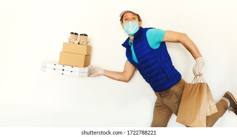 Funny Delivery Man In Uniform Face Mask Gloves Carrying Many Cardboard Boxes, Running And Hurrying To Deliver Takeout Food. Food Delivery Service Or Shopping Order Online.