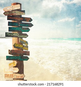 Funny Direction Signpost With Distance To Many Different Countries