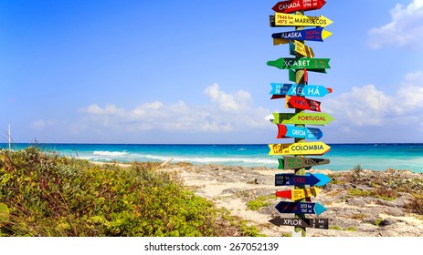 Funny Direction Signpost With Distance To Many Different Countries