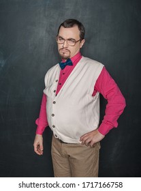 Funny Disappointed Teacher Or Business Man On Blackboard Background