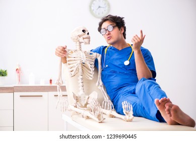 Funny Doctor With Skeleton In Hospital