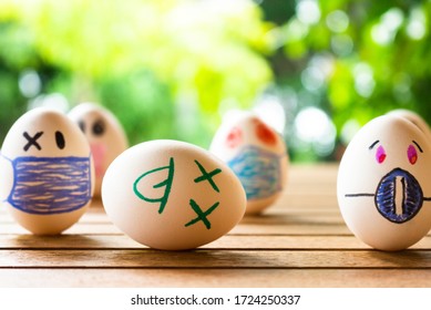 Funny Eggs With Human Faces. Eggs Wearing Face Masks Or Chinstraps. Selective Focus. Colored Chinstraps On White Eggs.