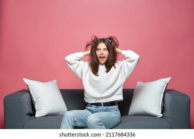 Funny Energetic Young Girl Ruffle Hair, Having Fun, Fooling, Grimacing, Sitting On Couch. Positive Emotions