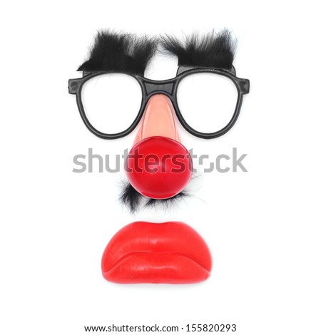 funny face: fake glasses and eyebrows, clown nose, mustache and mouth on a white background