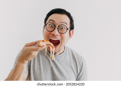 Funny Face Nerd Asian Man Has Cheesy Pizza Isolated On White Background.