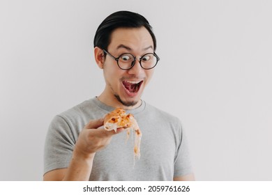 Funny Face Nerd Asian Man Has Cheesy Pizza Isolated On White Background.