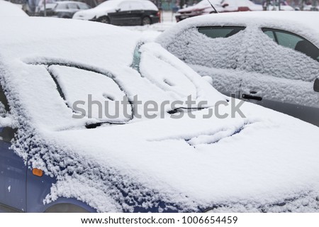 Funny Face On Snow Covered Cars Stock Photo (Edit Now ...