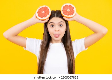 Funny Face. Teen Girl With Grapefruit. Vitamin And Fruits. Child Eating Orange.