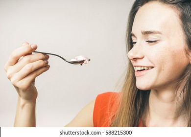Funny face woman eating