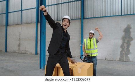 Funny Factory Workers Dance In The Factory . Happy People At Work .