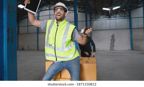 Funny Factory Workers Dance In The Factory . Happy People At Work .