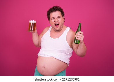 Funny Fat Man Drinks Light Beer.