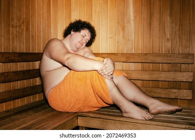 Funny Fat Man Is Relaxing In The Sauna.