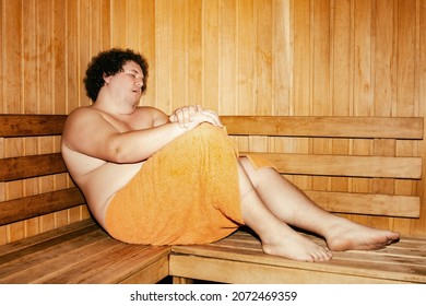 Funny Fat Man Is Relaxing In The Sauna.