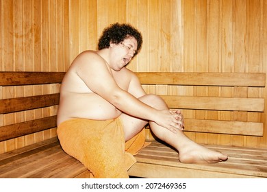 Funny Fat Man Is Relaxing In The Sauna.