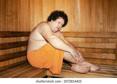 Funny Fat Man Is Relaxing In The Sauna.