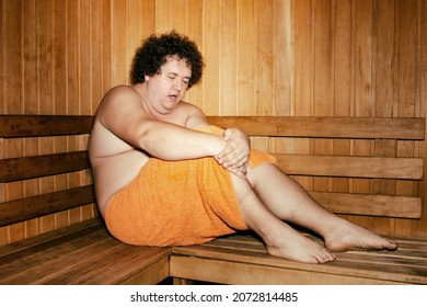 Funny Fat Man Is Relaxing In The Sauna.