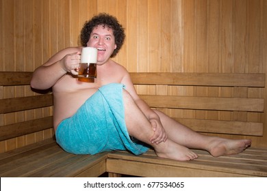 Funny Fat Man In A Sauna With A Beer. 