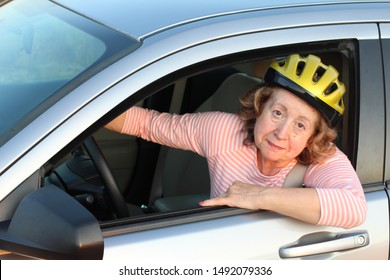 Funny Female Car Driver Wearing A Helmet 