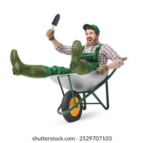 Funny gardener sitting inside a wheelbarrow, isolated on white background - Powered by Shutterstock