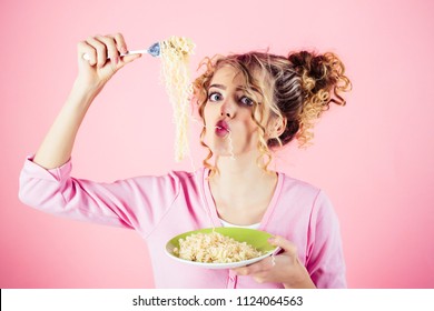 Funny Girl Eating Noodles. Morning Breakfast. Girl Hold Plate Of Spaghetti. Attractive Woman Eating Noodle. Adorable Woman With Curly Hair Eating Pasta. Fashion And Beauty. Diet, Food, Meal, Italy.