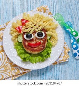 Funny Girl Food Face with Cutlet, Pasta and Vegetables