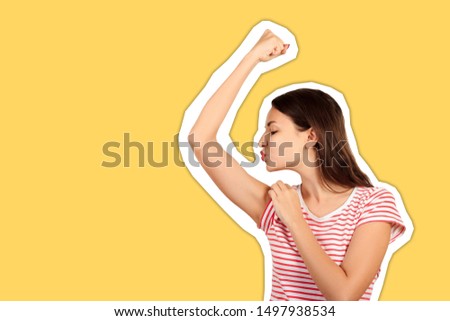 funny girl kisses on the camera her biceps. emotional girl isolated on Magazine collage style with trendy color.