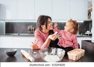 Funny Girl With Mom On Kitchen. In Dress. So Cune Family