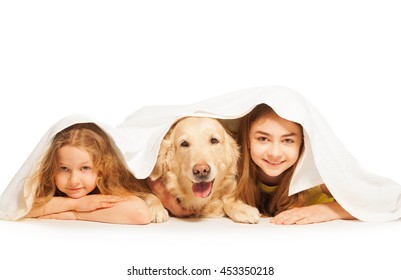 Funny girls and their pet covered with white towel - Powered by Shutterstock