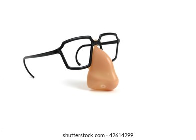 Funny glasses and plastic nose isolated on white