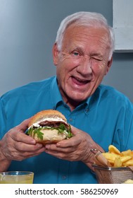 Funny Grandfather Eating Burger. Old Man Eat Burger.