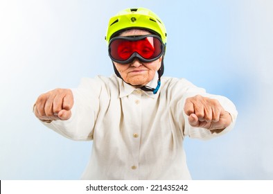 Funny Grandma Wearing A Yellow Bicycle Helmet And Ski  Goggles 