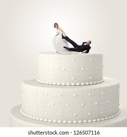 Funny Groom And Bride On Cake Top